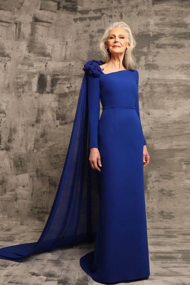 Royal blue one-shoulder formal gown with sheer cape sleeve for women over 60