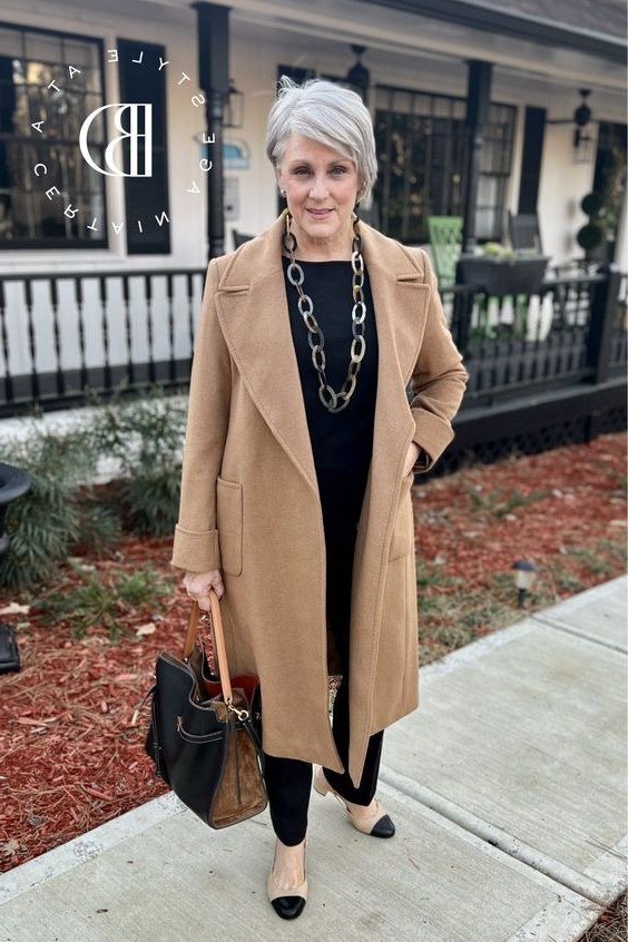 Camel Coat with Black Top and Chunky Chain Necklace, fall 2026 outfit for women over 60