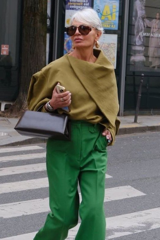 Olive Poncho Top with Green Tapered Trousers, fall 2026 outfit for women over 60