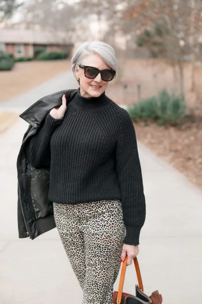 Black Turtleneck with Leopard-Print Trousers and Leather Jacket, fall 2026 outfit for women over 60