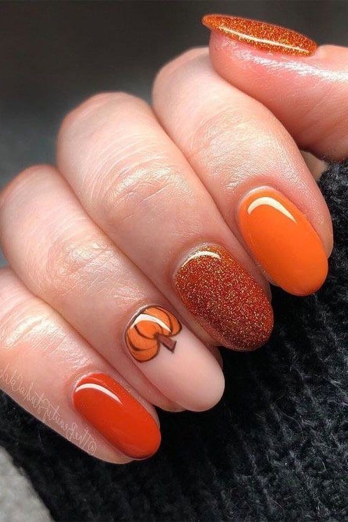 Orange Glitter with Pumpkin Art, fall nail color for women over 60