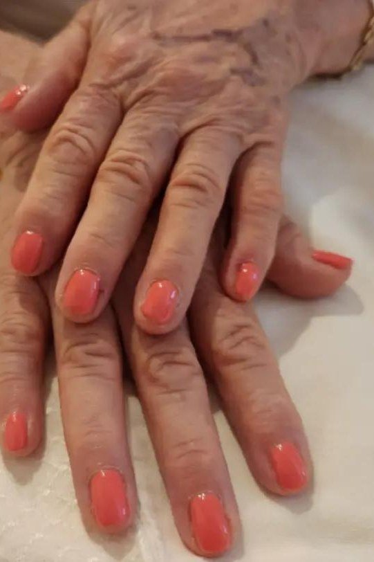 Warm Coral Short Nails, fall nail color for women over 60
