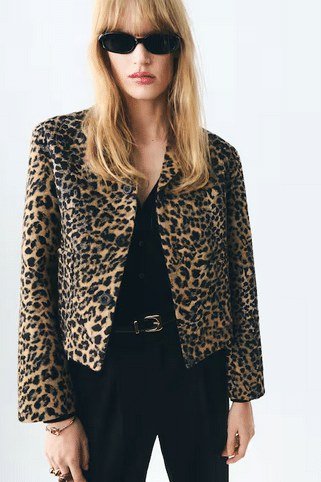 leopard print cropped jacket over black top, headless product shot - fall outfit idea for women over 70