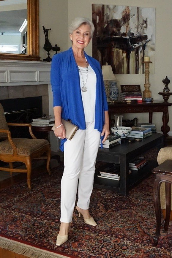 Royal blue cardigan over white top, white pants, full body front view - fall cardigan outfit idea for women over 60