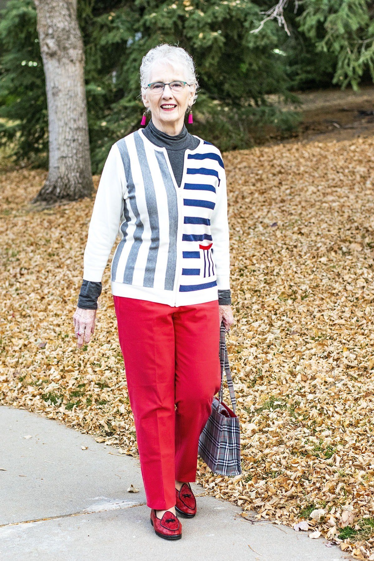 Blue-white striped cardigan with red wide-leg pants, full body front view - fall cardigan outfit idea for women over 60