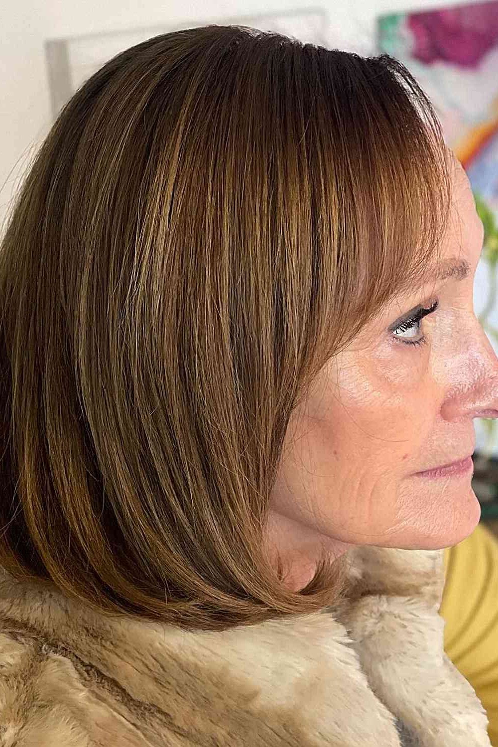 Sleek Brown Bob fall hairstyle for women over 50