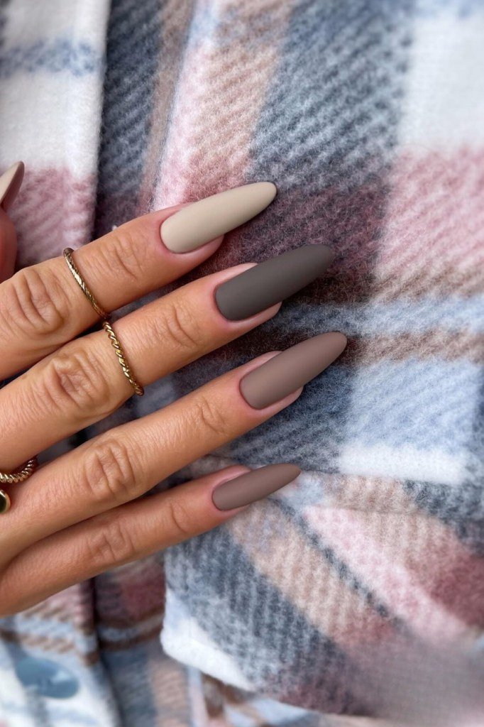 Long matte neutral nails in taupe, cream and gray