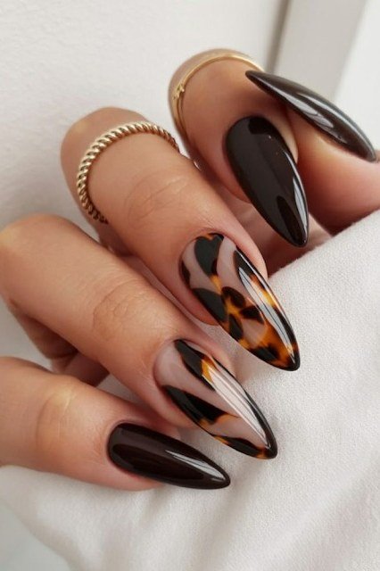 Tortoise and black almond shaped nails