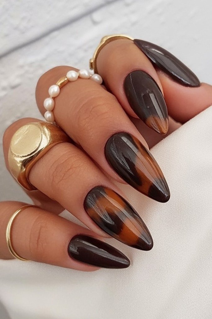 Tortoise ombre almond nails with gold rings