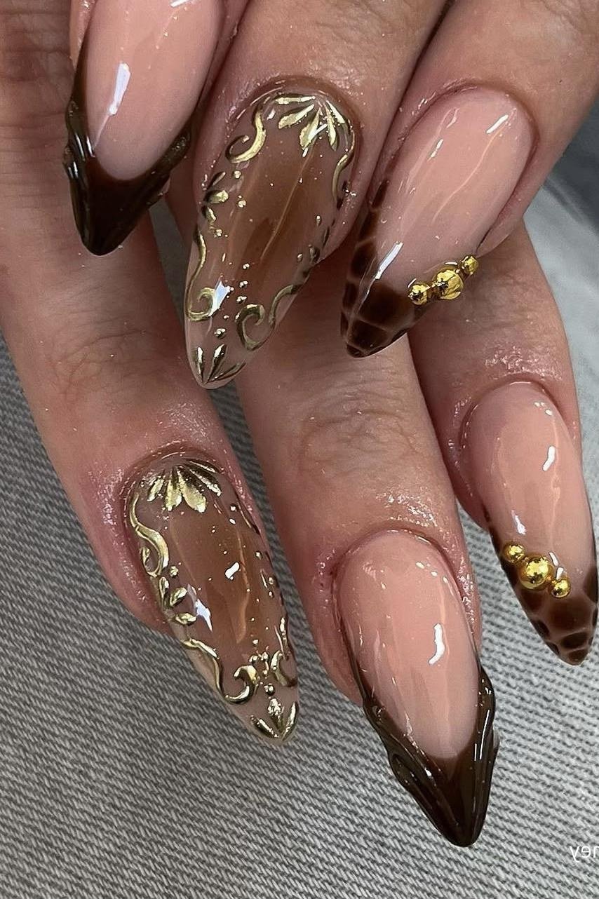 Chocolate French tips with gold nail art