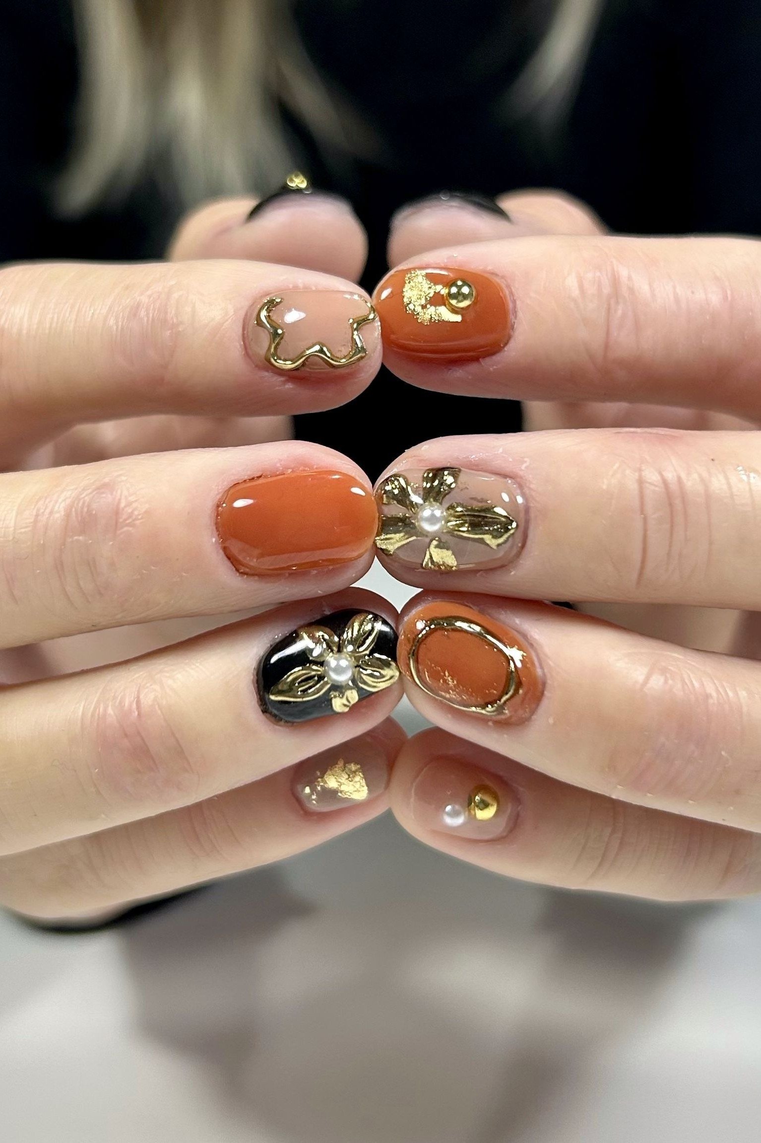 Orange, black and gold fall nails