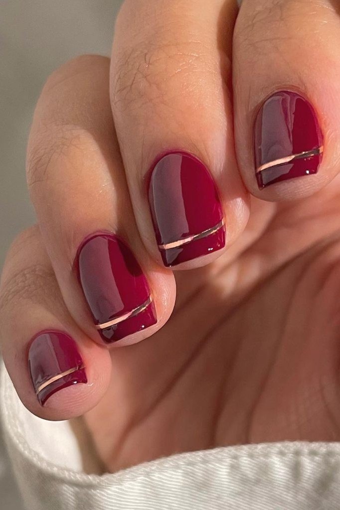 Red French tips on nude nails