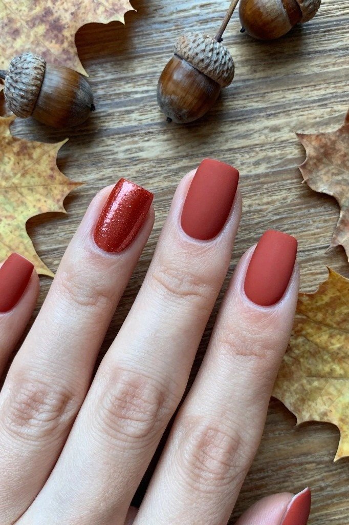 Burnt orange matte and glossy fall nails for women over 60