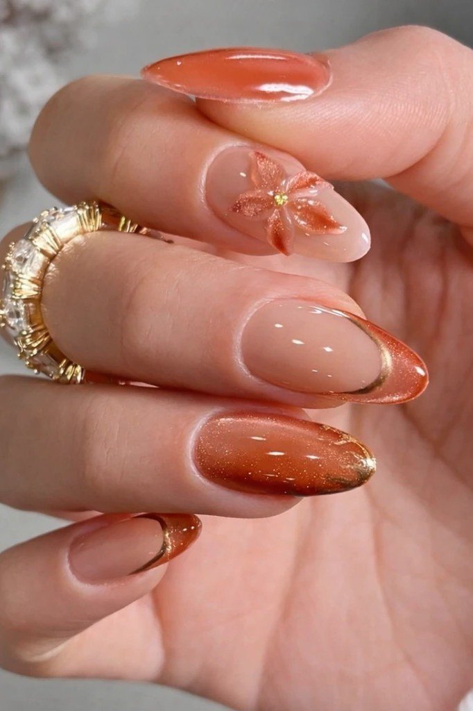 Caramel almond nails with gold leaf for women over 60