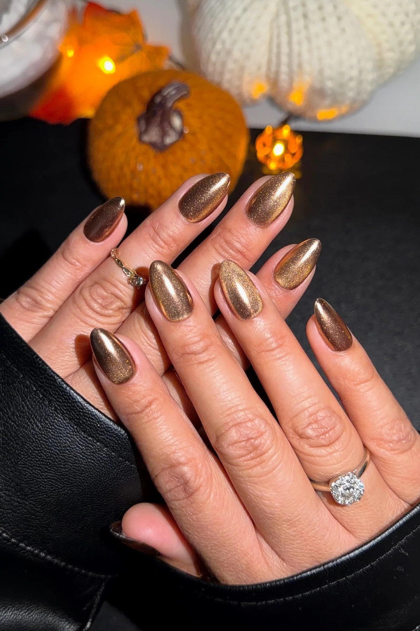 Bronze shimmer nails with pumpkins for women over 60