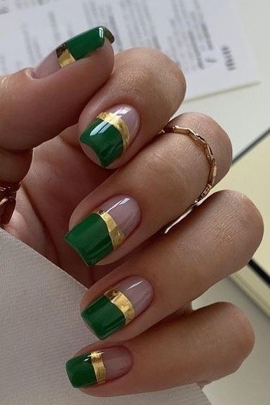Emerald and nude french nails with gold for women over 60