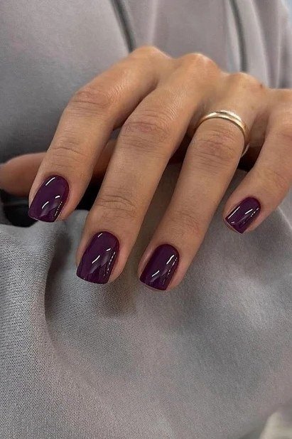 Deep plum short square nails for women over 60