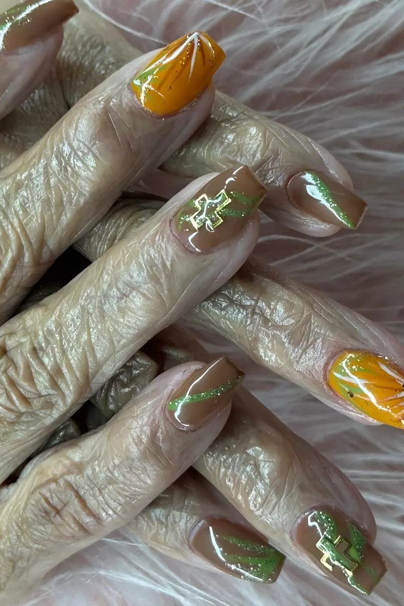 Olive green chrome nails with reflective finish
