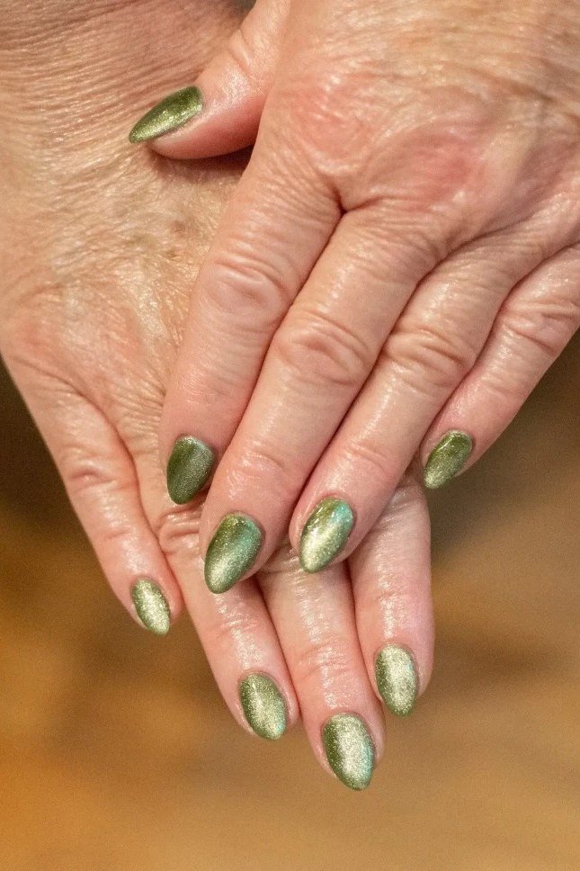 Sage green metallic shimmer nails