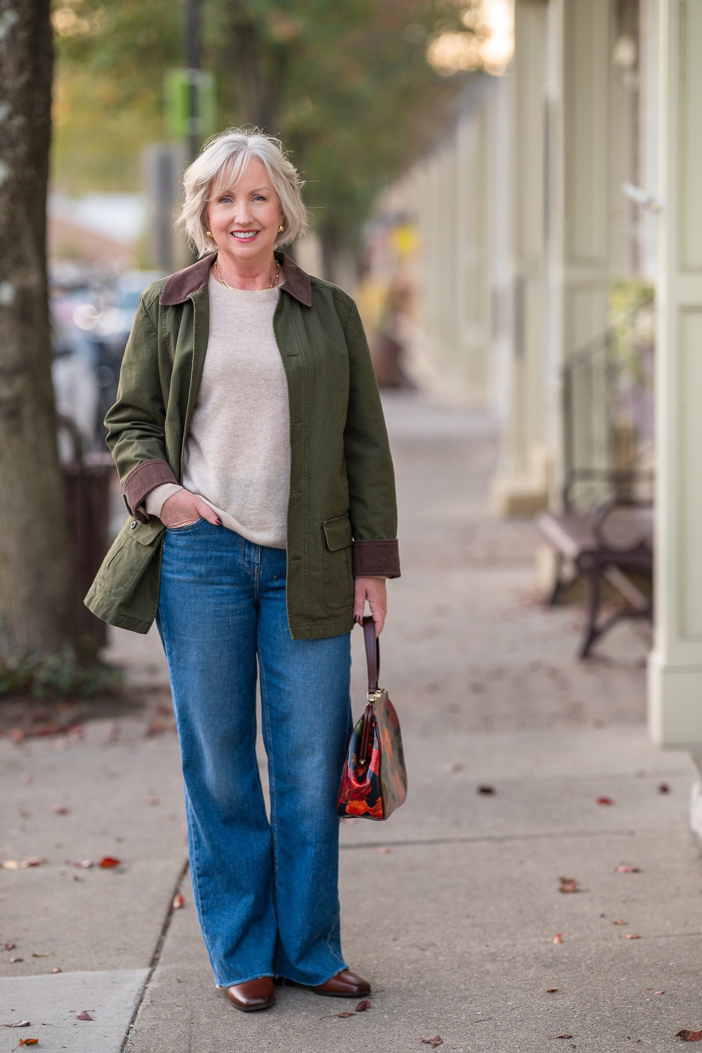 Olive utility jacket with cream top and wide leg jeans