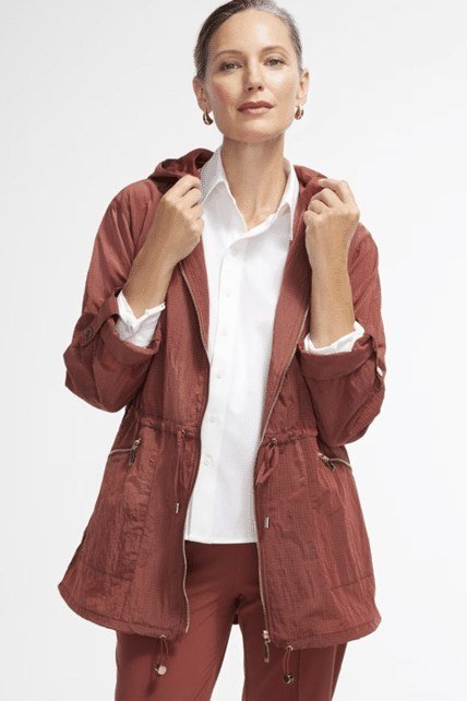 Rust field jacket with white shirt and rust pants fall outfit