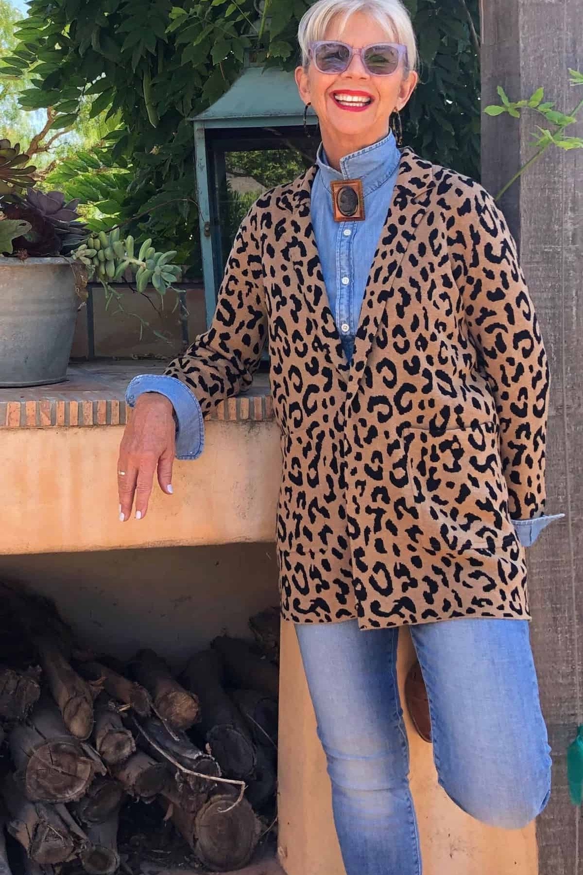 Leopard print jacket with blue shirt and jeans fall outfit
