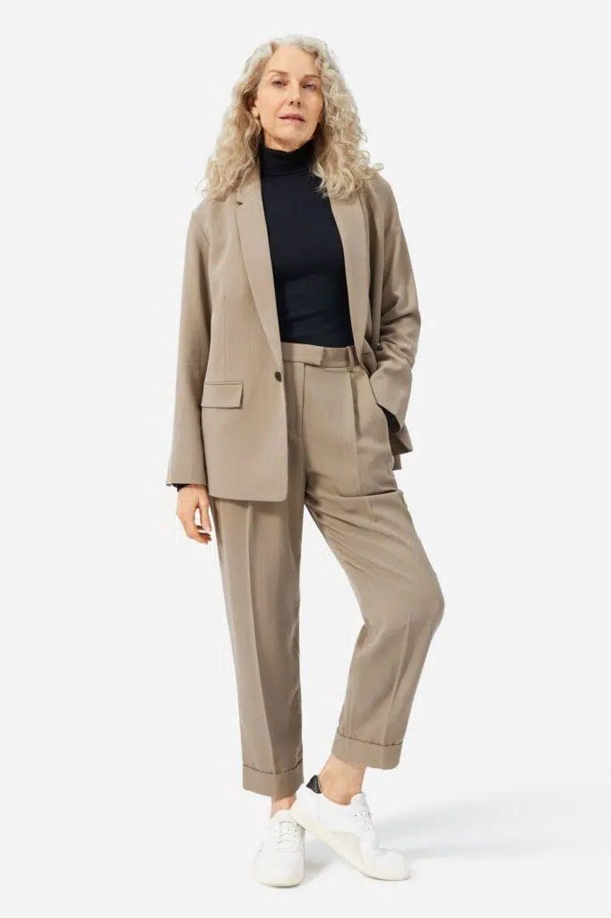 taupe oversized blazer with black top and taupe tapered trousers, fall work outfit for women over 50
