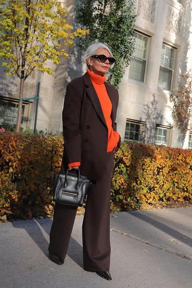 chocolate brown suit with burnt orange turtleneck, fall work outfit for women over 50