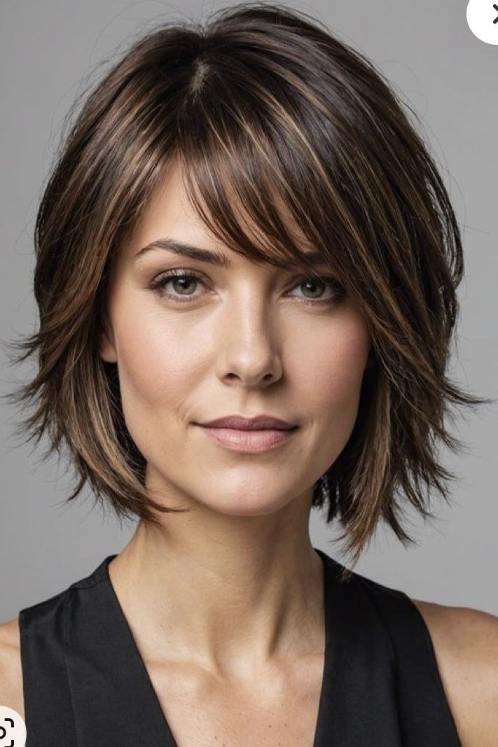 Dark Brunette Feathered Bob on an older woman - elegant feathered bob hairstyle idea