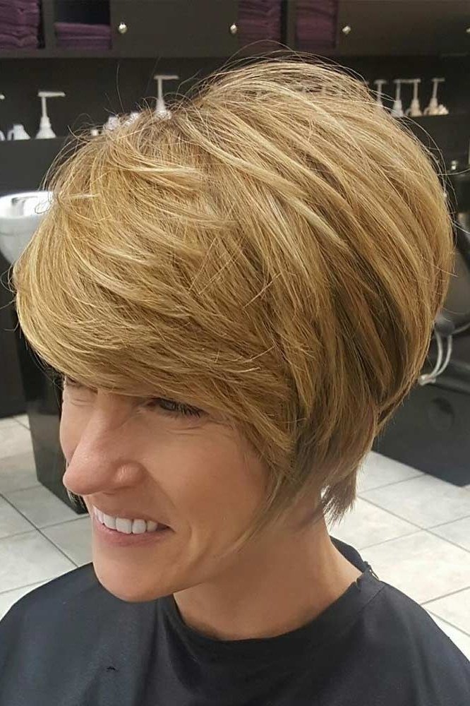 Golden Rounded Feathered Bob on an older woman - elegant feathered bob hairstyle idea