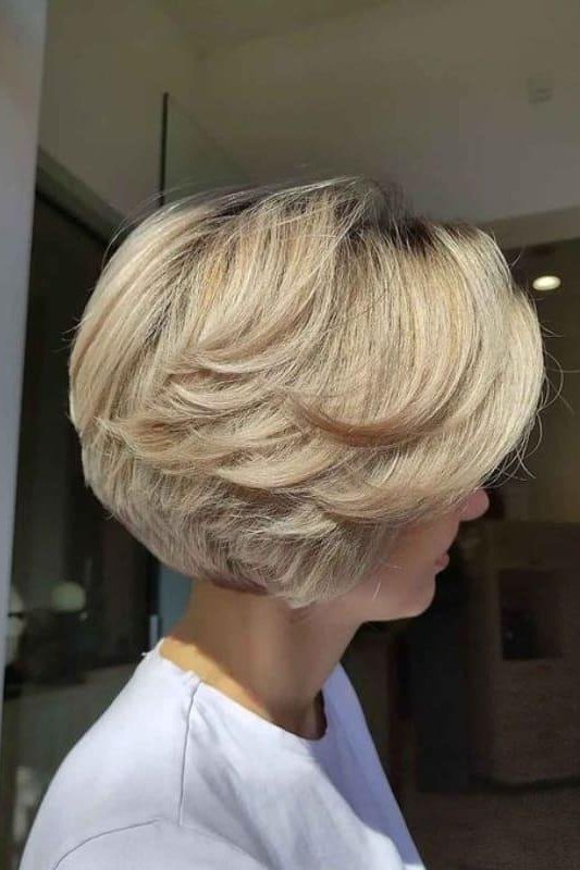 Blonde Rounded Feathered Bob on an older woman - elegant feathered bob hairstyle idea