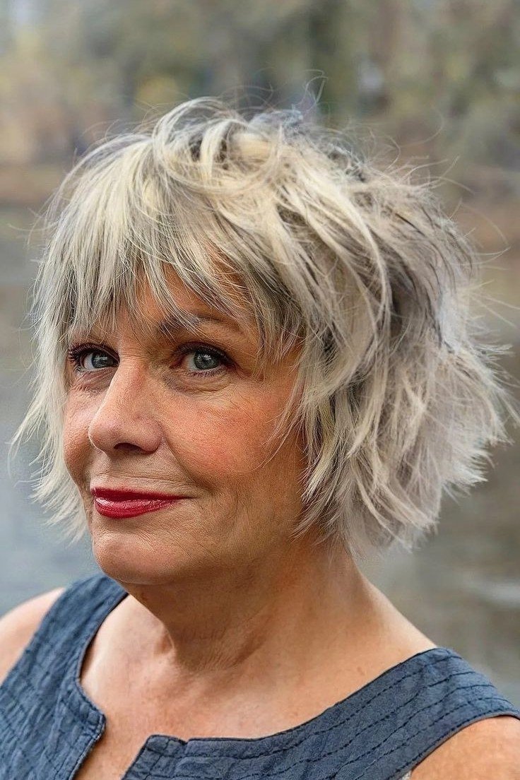 Silver Shaggy Feathered Bob on an older woman - elegant feathered bob hairstyle idea
