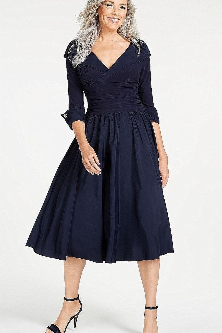 Navy wrap fit-and-flare midi dress with three-quarter sleeves for grey-haired woman