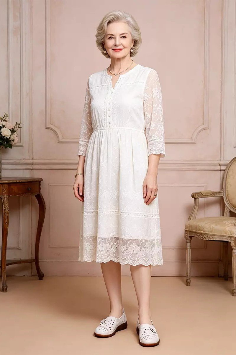White lace fit-and-flare midi dress with three-quarter sleeves for women over 60