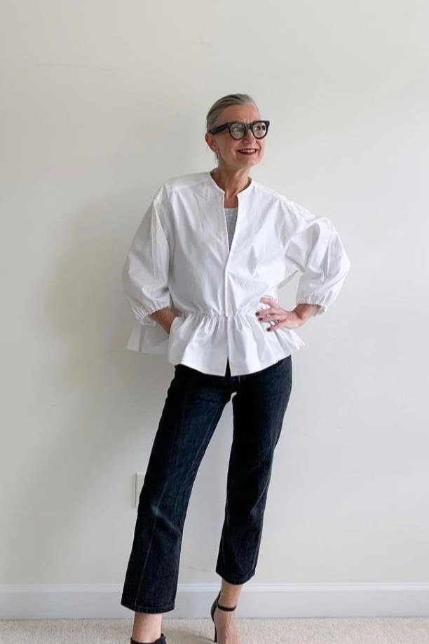 A white peplum top with dark cropped jeans and black heels is feminine and fun. The peplum shape flares gracefully. Glasses add a smart finish. A pretty choice for dinner or evening events.