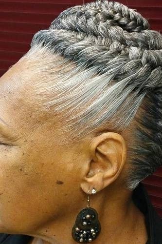 Braided silver side braid, profile, red background grey hairstyle for women over 50