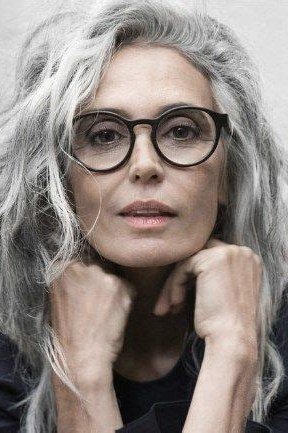 Long wavy grey hair, glasses, close portrait grey hairstyle for women over 50