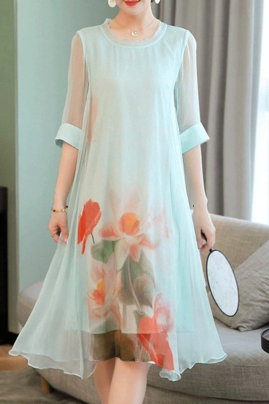 Mint green chiffon midi dress with coral floral print, airy summer elegance for mature women
