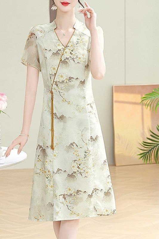 Cream midi dress with a botanical print, artful summer dress for older women