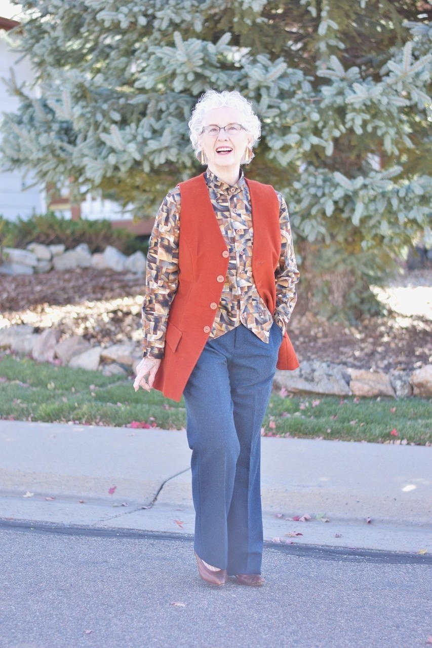 Rust quilted vest with blue jeans, casual fall outfit for women over 40