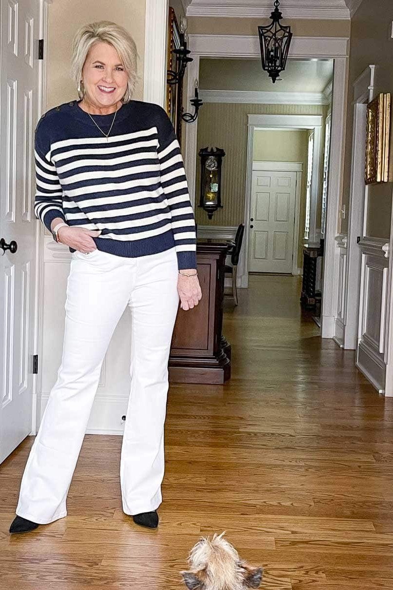 Striped Sweater with White Flare Jeans - fall jeans outfit for women over 40
