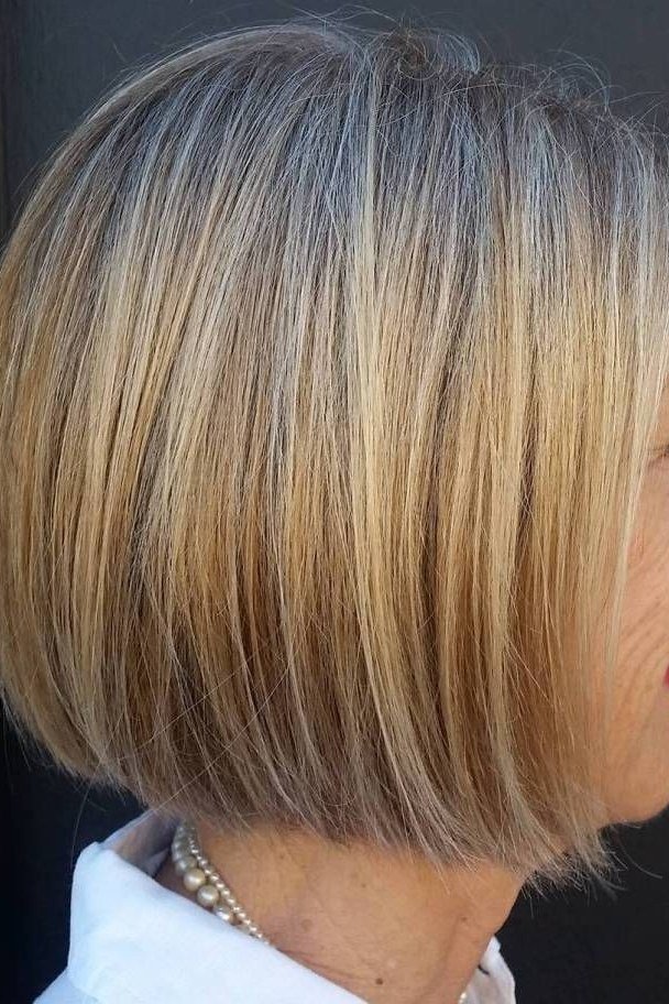 Blonde straight bob on a woman over 60, side view