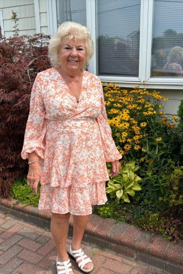 Flattering peach floral tiered midi, garden for women over 60