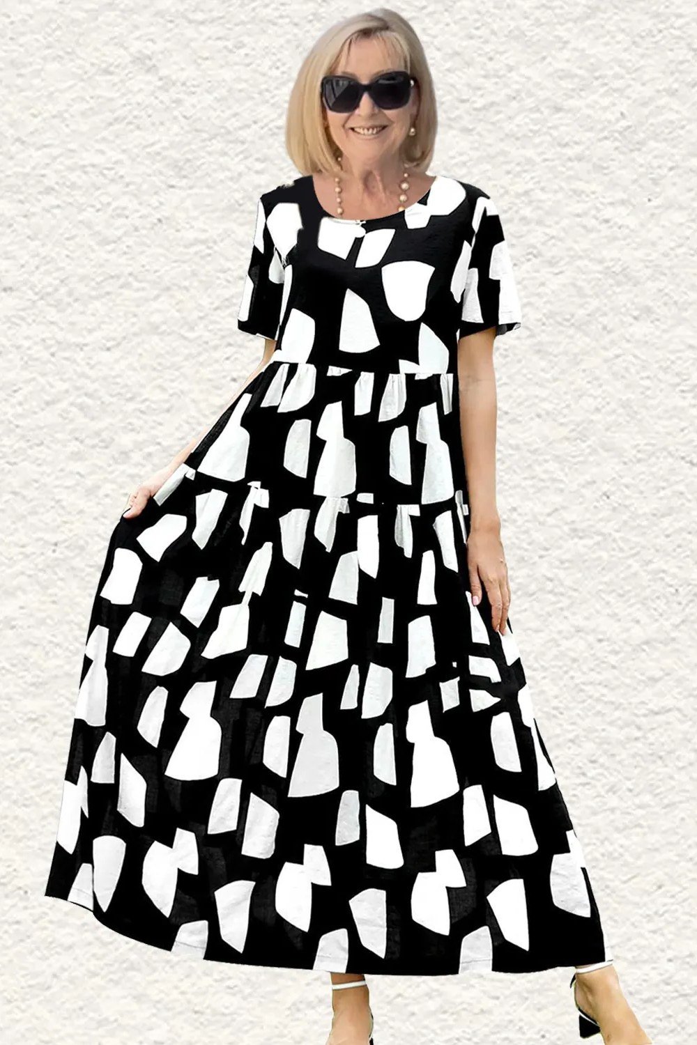 Flattering black and white geometric midi, studio for women over 60