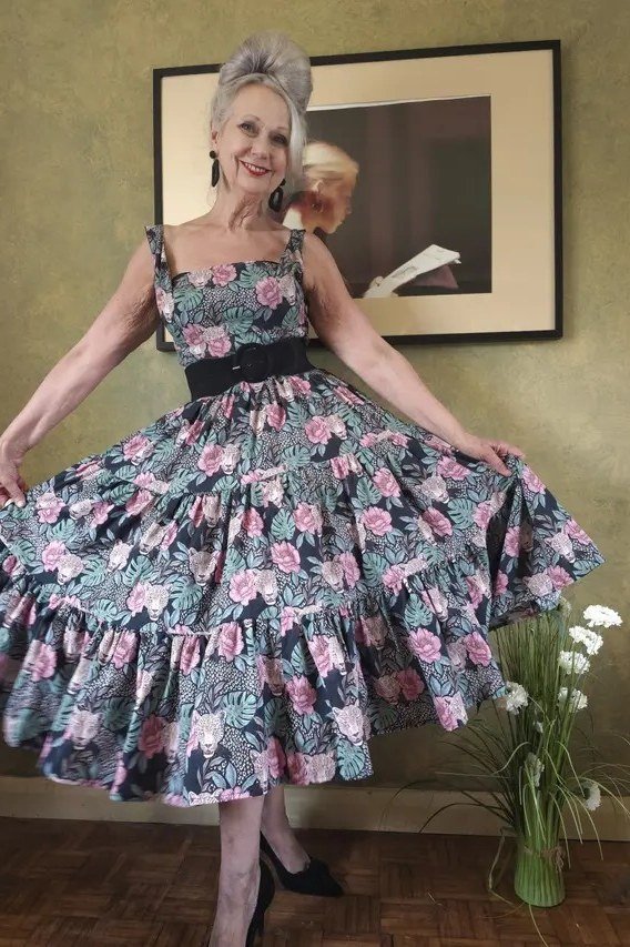 Gray dress with pink floral twirling, dark belt