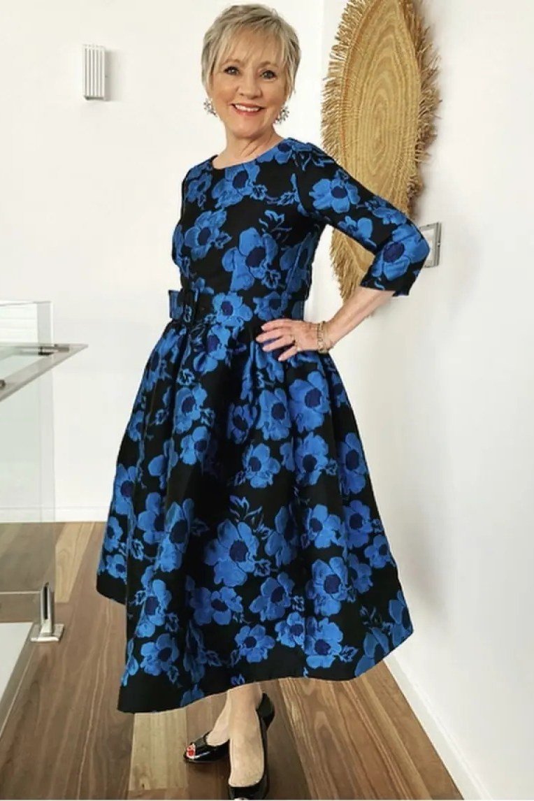 Navy midi dress with pink and blue floral, white interior