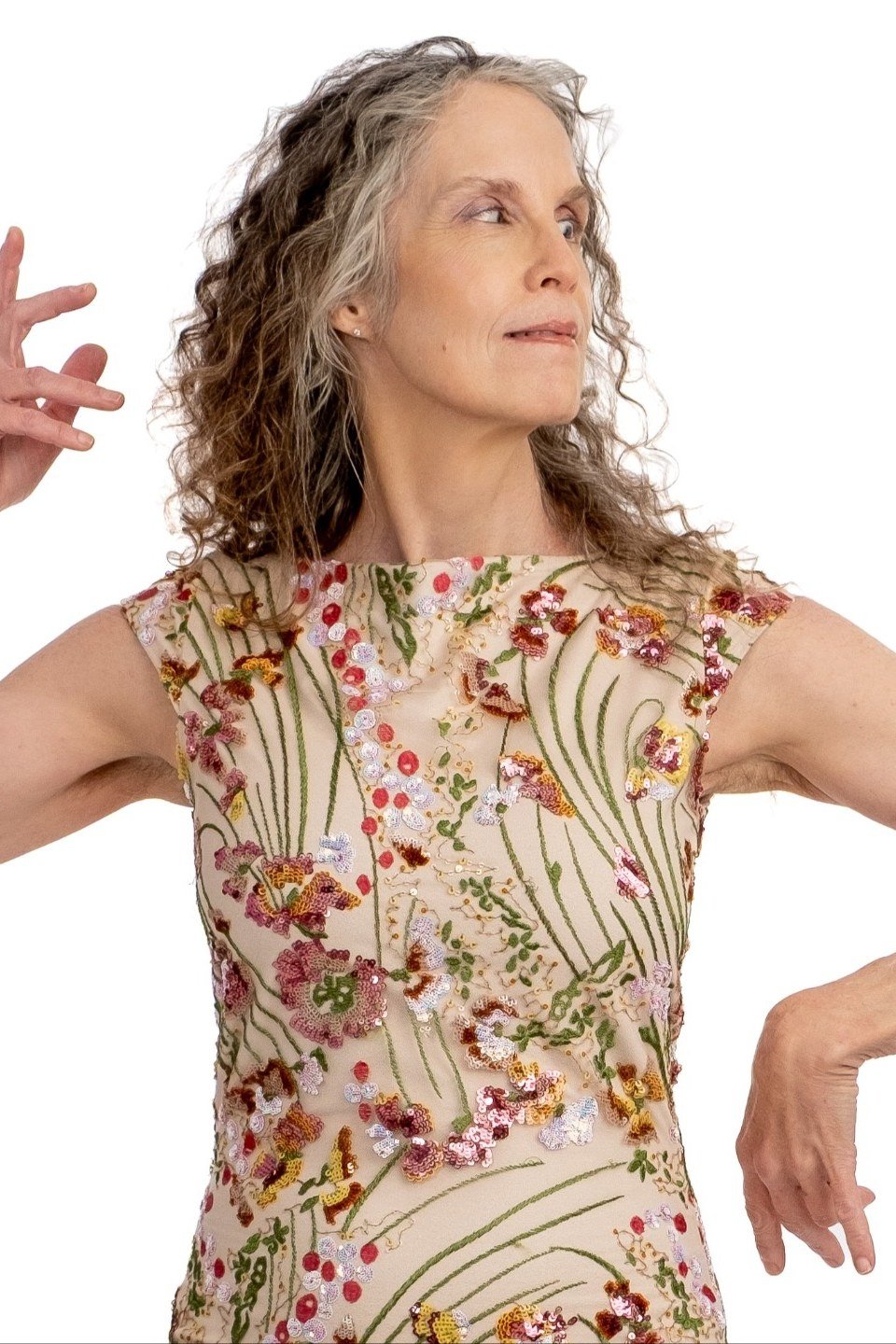 Beige sleeveless dress with delicate floral print, elegant