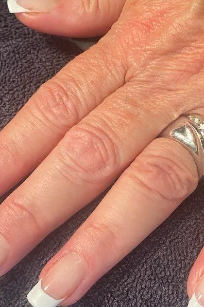 Square-Shaped French Tips, french tip nails for women over 70, elegant manicure on mature hands