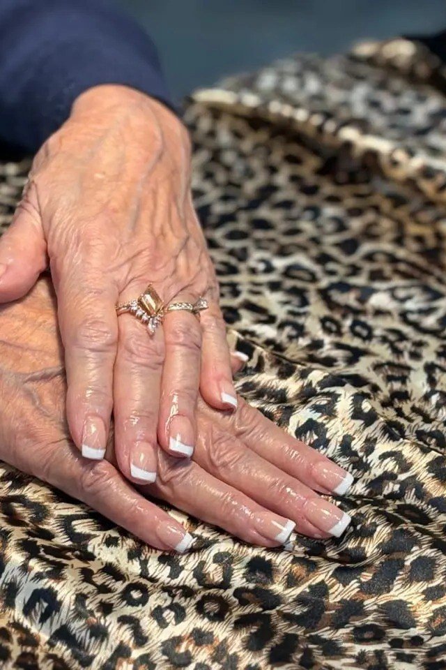 Short French Tips with Everyday Style, french tip nails for women over 70, elegant manicure on mature hands