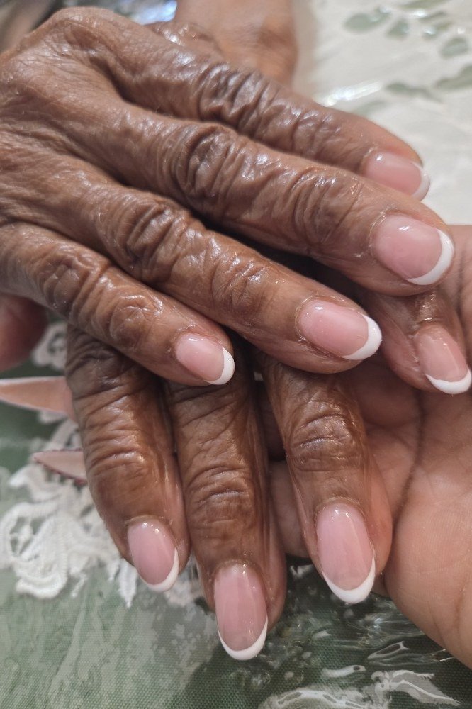 French Tips on Beautiful Deep Skin, french tip nails for women over 70, elegant manicure on mature hands